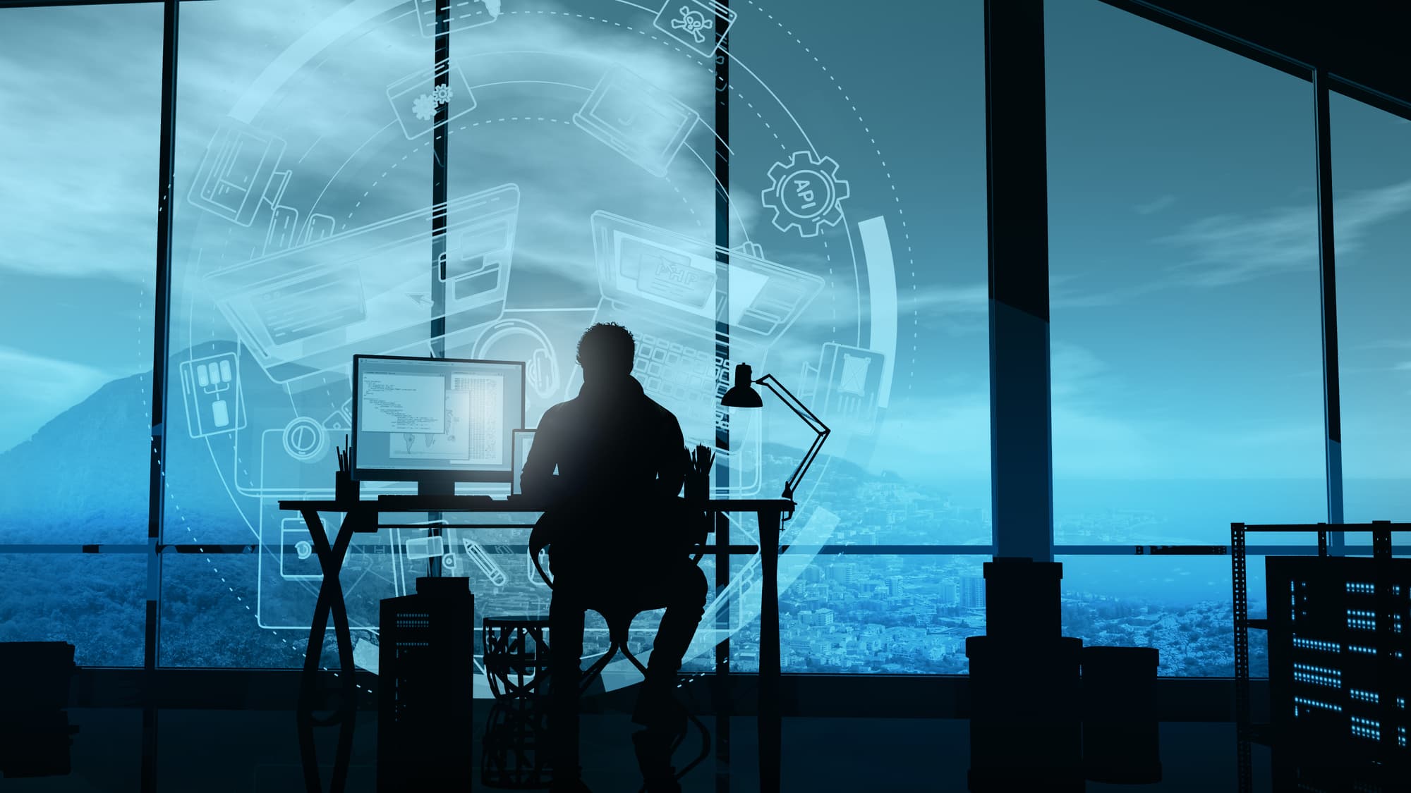 The web developer works in his office on the infographics background. - depositphotos.com
