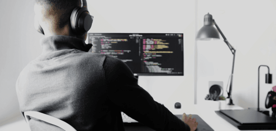 Man at computer coding